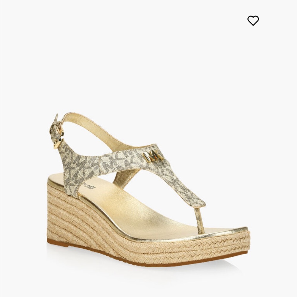 Michael Kors “Laney Thong” platform sandals in pale gold.